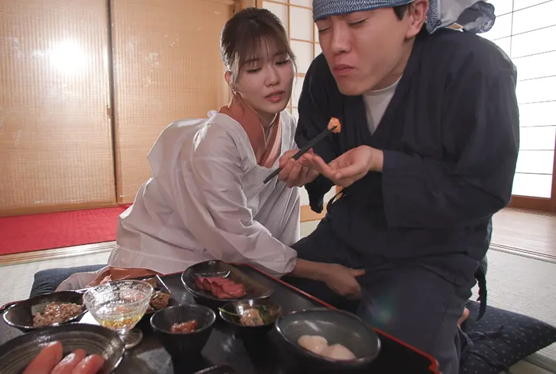 Jinguji Nao feeding a guy while groping his dick